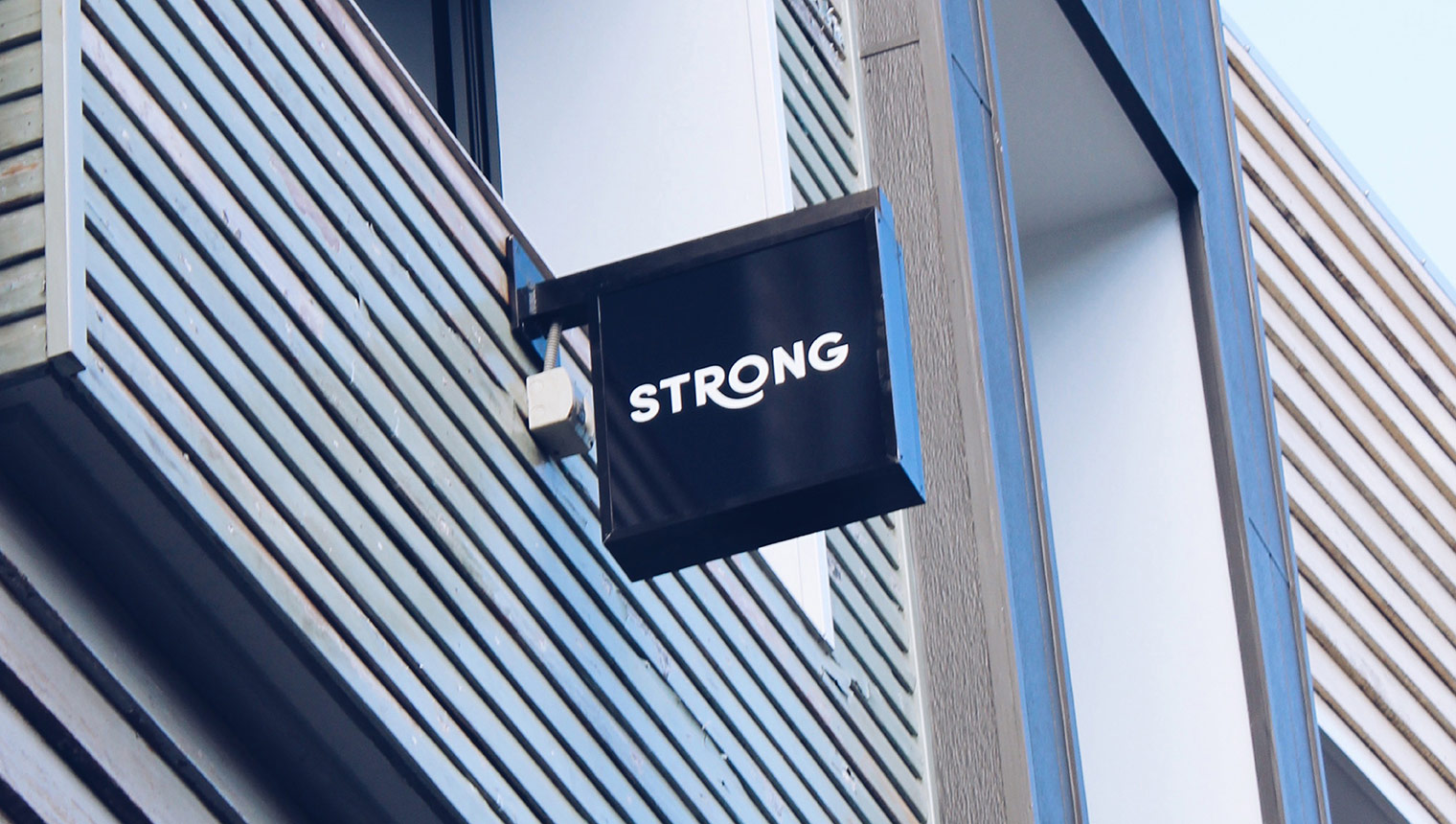 Sign outside strong digital office showing brand identity