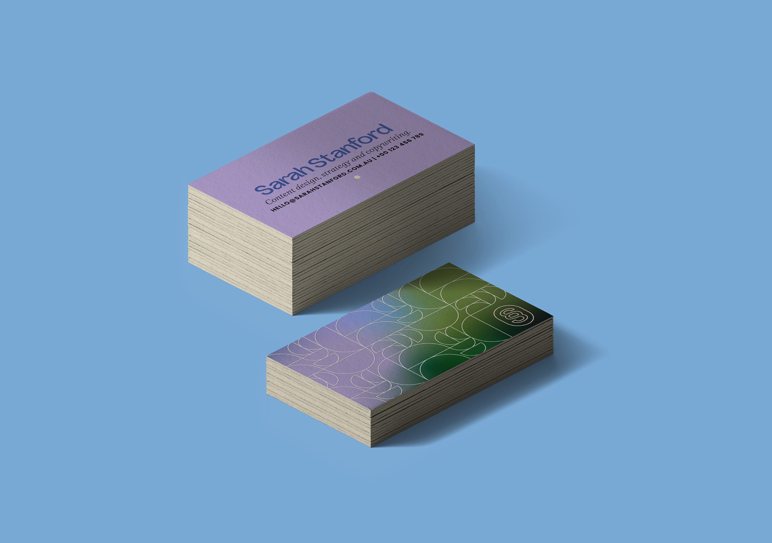 Brand identity case study showing the Sarah Stanford business cards on a light blue background. The front of the card features a purple and green gradient with the brand pattern overlaying with the back card featuring founder Sarah’s details.