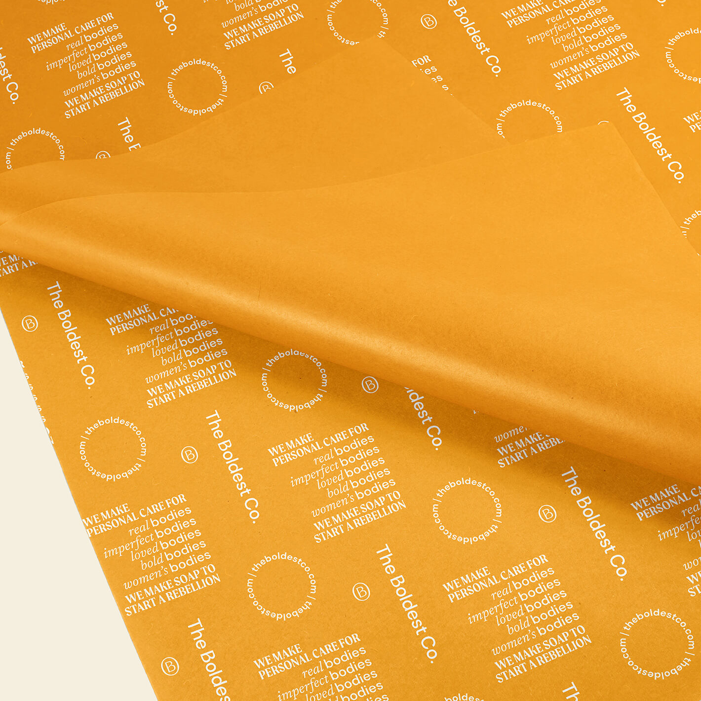 Brand design portfolio image of The Boldest Co’s bright yellow tissue paper. The brand’s values and supporting brand icons appear in white.